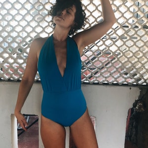 Badpak met diep uitgesneden V-hals | Romper met open rug