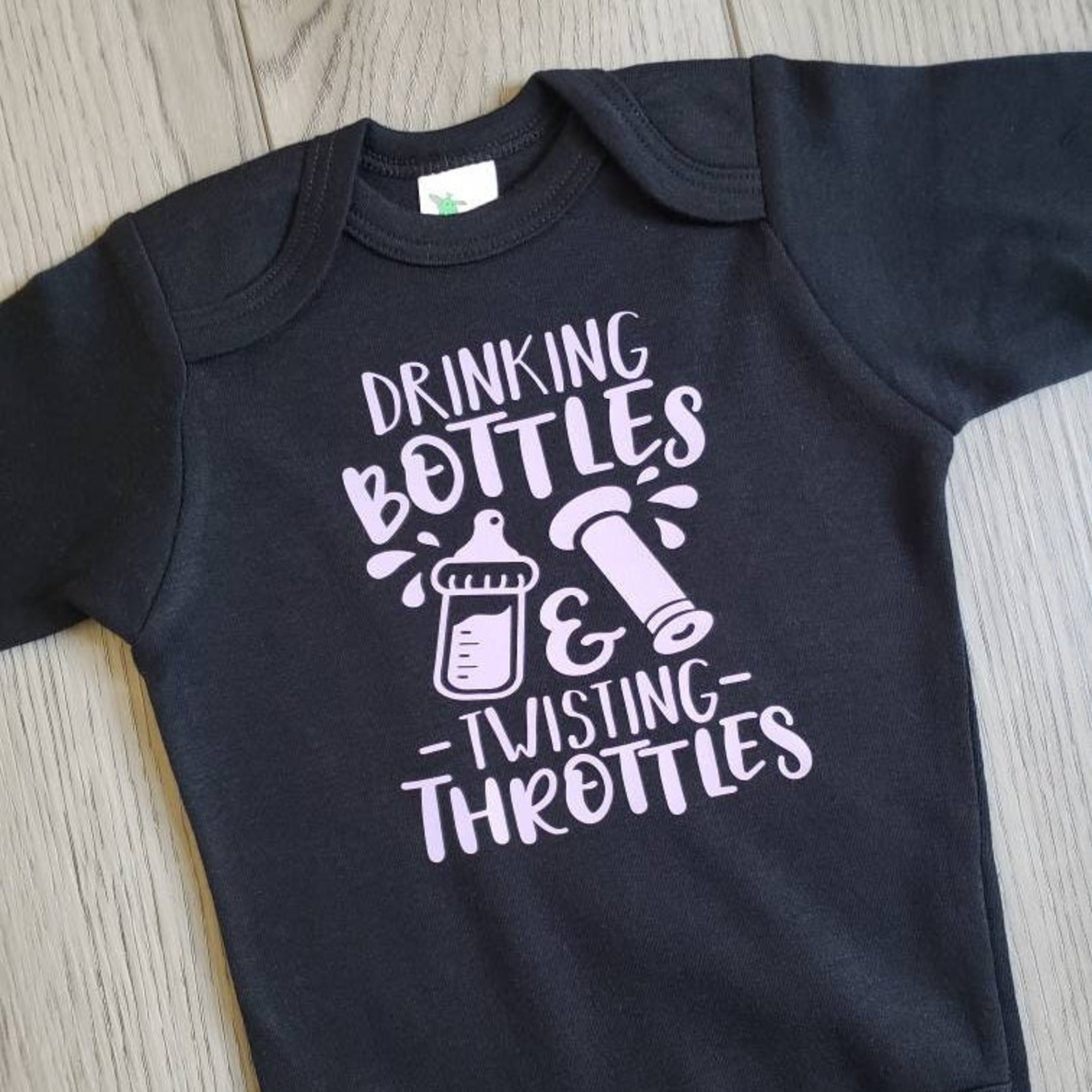 Drinking Bottles and Twisting Throttles Dirt Bike Baby Onesie