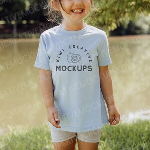 Light Blue Kids T-Shirt Mockup: Toddler Model (JPEG)