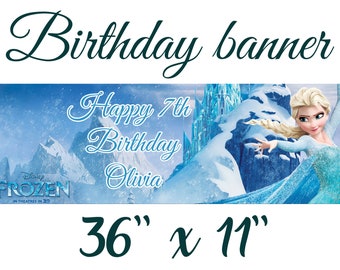 May include: A Frozen themed birthday banner featuring a blue and white winter scene with Elsa from the movie. The banner says "Happy 7th Birthday Olivia" and measures 36 inches by 11 inches.
