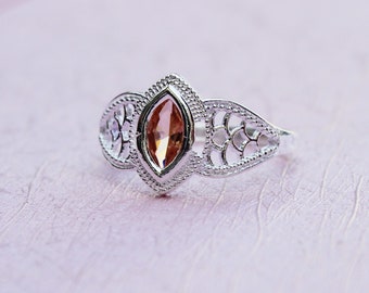 Affordable Simulated Garnet Pear Daily Wear Ring in Brass with Platinum Tone