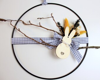 Modern Easter decoration with bunnies and dried flowers, flower hoop loop, metal ring for doors and windows, home accessory with hanger