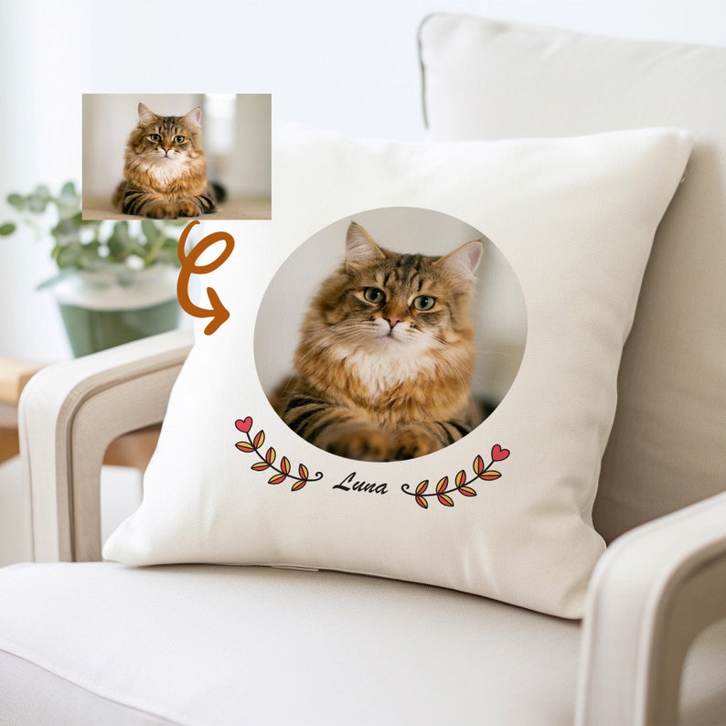 May include: A white pillow with a brown cat photo in a circle, surrounded by red hearts and orange leaves. The text "Luna" is written below the photo.