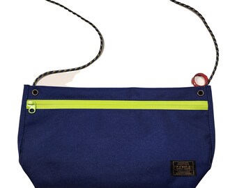 Mogibranding blue nylon crossbody bag with hand rolled rope shoulder strap