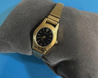 Reloj de mujer vintage Armitron Deauville Line Diamond Quartz tono dorado