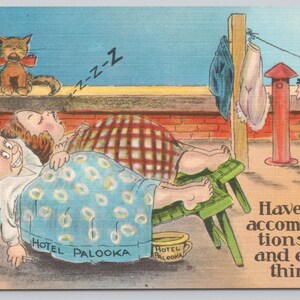May include: A vintage postcard illustration featuring two figures sleeping on green cots under a yellow sun and a cat. The text reads: Hotel Palooka, Hotel Palooka, and Have swell accommodations-view and everything. Laundry hangs on a line nearby.