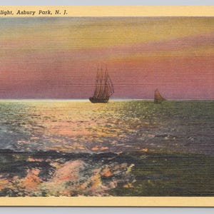 May include: A vintage postcard depicting a seascape at sunset with two sailboats on the water. The sky is a vibrant mix of pink, orange, and yellow, reflecting on the water's surface. The text on the postcard reads "Ocean Twilight, Asbury Park, N. J."