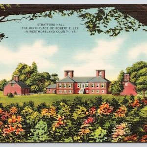May include: A vintage postcard depicting Stratford Hall, the birthplace of Robert E. Lee in Westmoreland County, Virginia. The postcard shows a brick house with a white roof and a lush green lawn. The house is surrounded by trees and flowers.