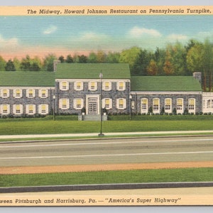 May include: A vintage postcard depicting a stone building with a green roof. The building is labeled "The Midway, Howard Johnson Restaurant on Pennsylvania Turnpike, Bedford, Pa.". The postcard also includes the text "Midway between Pittsburgh and Harrisburg, Pa. "America's Super Highway""