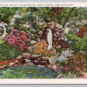 May include: Vintage postcard featuring The Shrine of Our Lady of the Mountains in North Conway, New Hampshire. The image showcases a serene garden with a statue, a pond with lily pads, and vibrant flowers. The text "THE SHRINE OF OUR LADY OF THE MOUNTAINS, NORTH CONWAY, NEW HAMPSHIRE" is visible.