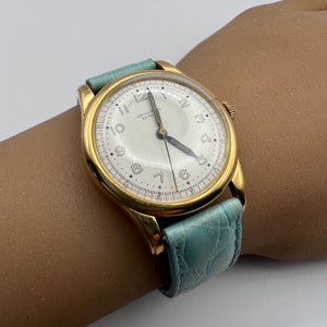 H. 1945 Seltenes Sammlerstück und Original 18 Karat Gold Mid-Century Universal Geneve Uhr. Am 10.03.2025 gereinigt und gewartet. VERSANDFERTIG!!