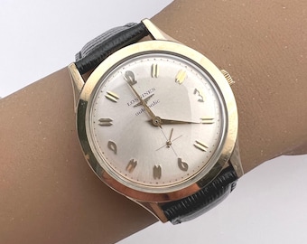 Ca 1955, vintage fin samlarklocka i 10k guldfyllt Longines automatisk dressklocka från mitten av århundradet. Rengjord och servad 2024-12-01. KLAR FÖR LEVERANS!
