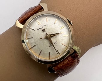 c. 1955 Collectible 10k Gold Filled Mid-Century Gruen 21 Jewel Mechanical Dress Watch. Included is a Free 400 Dollar Service & Restoration
