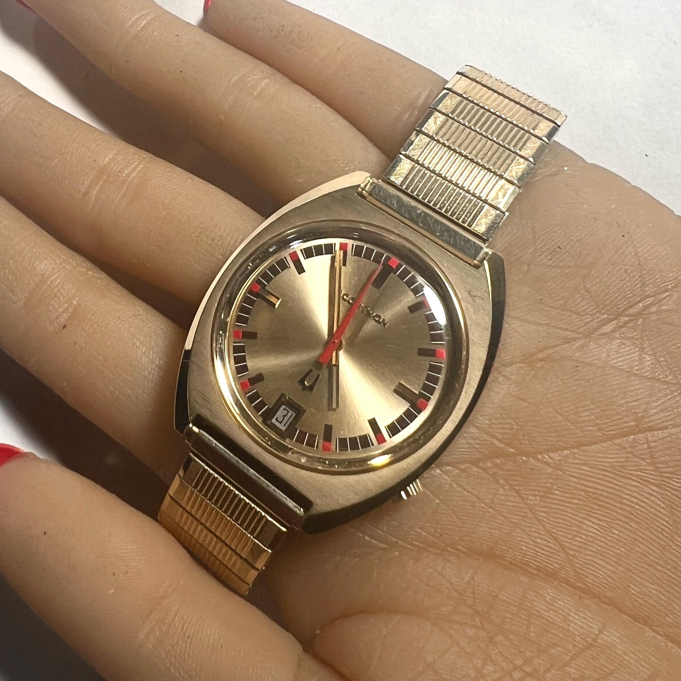 Bulova accutron 14 k gold case - Etsy 日本