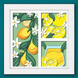 Könnte beinhalten: Ein weißer Rahmen mit grünem Hintergrund und einem Papier-Ausschnitt-Design aus Zitronen und Blumen. Die Zitronen sind gelb und die Blumen sind weiß. In der rechten unteren Ecke befindet sich ein Glasgefäß mit gelber Flüssigkeit.