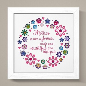May include: White framed print with a pink, green, blue, and purple floral design. The text reads "a Mother is like a flower, each one beautiful and unique."