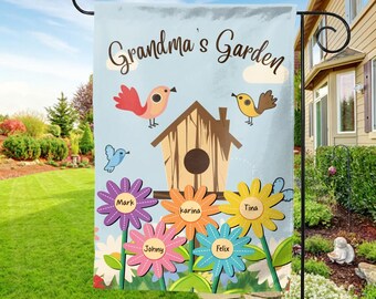 May include: A garden flag with the text "Grandma's Garden" and a birdhouse design. The flag features colorful flowers with names and cartoon birds against a light blue background. The flag is designed for outdoor use.