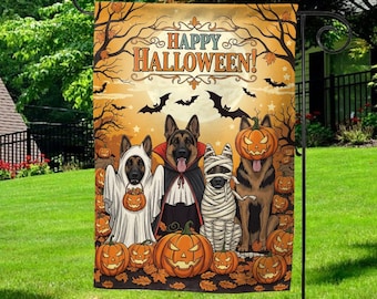 May include: Halloween garden flag featuring German Shepherds dressed in costumes. The flag reads "Happy Halloween!" and includes images of pumpkins, bats, and fall leaves. The dogs are dressed as a ghost, vampire, mummy, and a pumpkin.