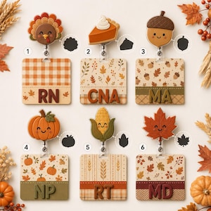 May include: Six square badge reels with autumn-themed toppers including a turkey, pumpkin pie slice, acorn, pumpkin, corn, and maple leaf. Each reel features a patterned base with professional acronyms RN, CNA, MA, NP, RT, and MD in raised letters.
