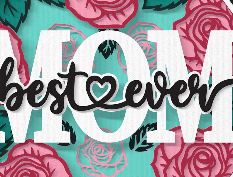 May include: White letters spelling "MOM" with the words "best ever" in black script with a heart in the middle. The background is a turquoise blue with pink and red paper roses.