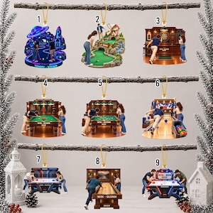 May include: Nine flat hanging ornaments featuring various recreational activities including miniature golf, darts, billiards, bowling, air hockey, and shuffleboard. Each ornament displays two people engaged in the game with custom text like Tommy-Vivian.