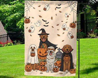 May include: Halloween garden flag featuring cartoon dogs dressed in costumes. The dogs are dressed as a witch, a mummy, a vampire, and a ghost. Pumpkins, bats, ghosts, and leaves are scattered across the tan background.