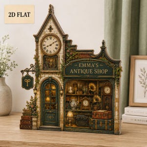May include: A 2D flat decorative display featuring a detailed illustration of Emma's Antique Shop. The structure includes a clock tower, a green arched door, and a shop window filled with miniature items like a typewriter, clocks, and trunks.