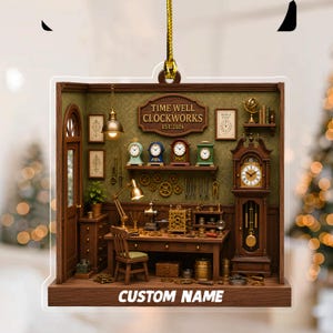 May include: A flat, rectangular hanging ornament featuring a detailed illustration of a clockmaker's workshop. The scene includes a wooden desk, a tall grandfather clock, various small clocks on shelves, and a sign reading TIME WELL CLOCKWORKS EST. 2024.
