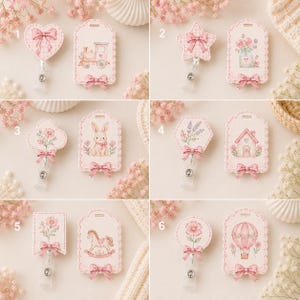 May include: A collection of six sets of badge reels, each featuring a unique shape and a rectangular tag. The designs include pastel pink illustrations of a train, flowers, a rabbit, a house, a rocking horse, and a hot air balloon, all accented with bows.