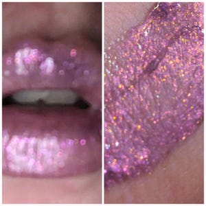 May include: A vibrant purple lipstick with a high-shine, glittery finish applied to the lips. The texture appears metallic and reflective, featuring fine shimmering particles that catch the light, creating a multi-dimensional, sparkling effect.