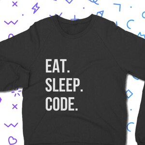 May include: Black sweatshirt with the text "EAT. SLEEP. CODE." in white lettering.