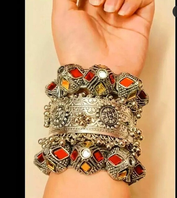 Multiple 2024 silver bangles
