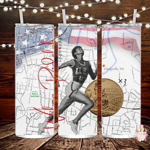 May include: Three stainless steel tumblers with a map of Clarksville, Tennessee, a running athlete, and a gold medal. The tumblers are decorated with red, white, and blue colors. The text "1940-1994" is written on the tumbler in the middle. The text "Clarksville, TN" and "x3" are written on the tumbler on the right.