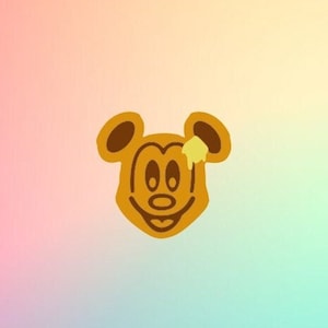 May include: A cartoon illustration of Mickey Mouse's face with a yellow drip on his head. The background is a gradient of pink, orange, and blue.