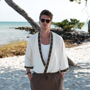 Men’s kimono jacket, perfect for festivals, beachwear, and casual outings. Made from natural fabrics, offering comfort and a standout retro style. Lightweight and breathable for warm weather. Handmade with attention to detail. Fast shipping available