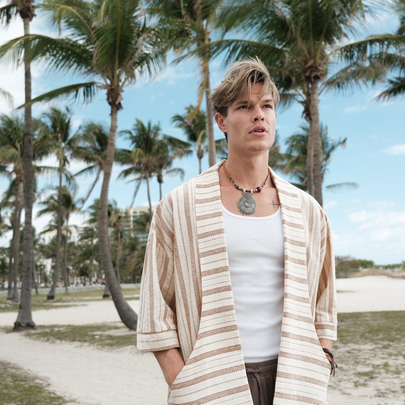 Men's retro linen kimono, perfect for beach parties and music festivals. Lightweight and breathable, offering comfort and style. The unique design stands out in any crowd. Made from high-quality linen, ideal for those who embrace vintage fashion.