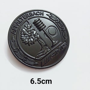 1 Logo AMG Affalterbach w kolorze czarnym, metalowym 6,5 cm