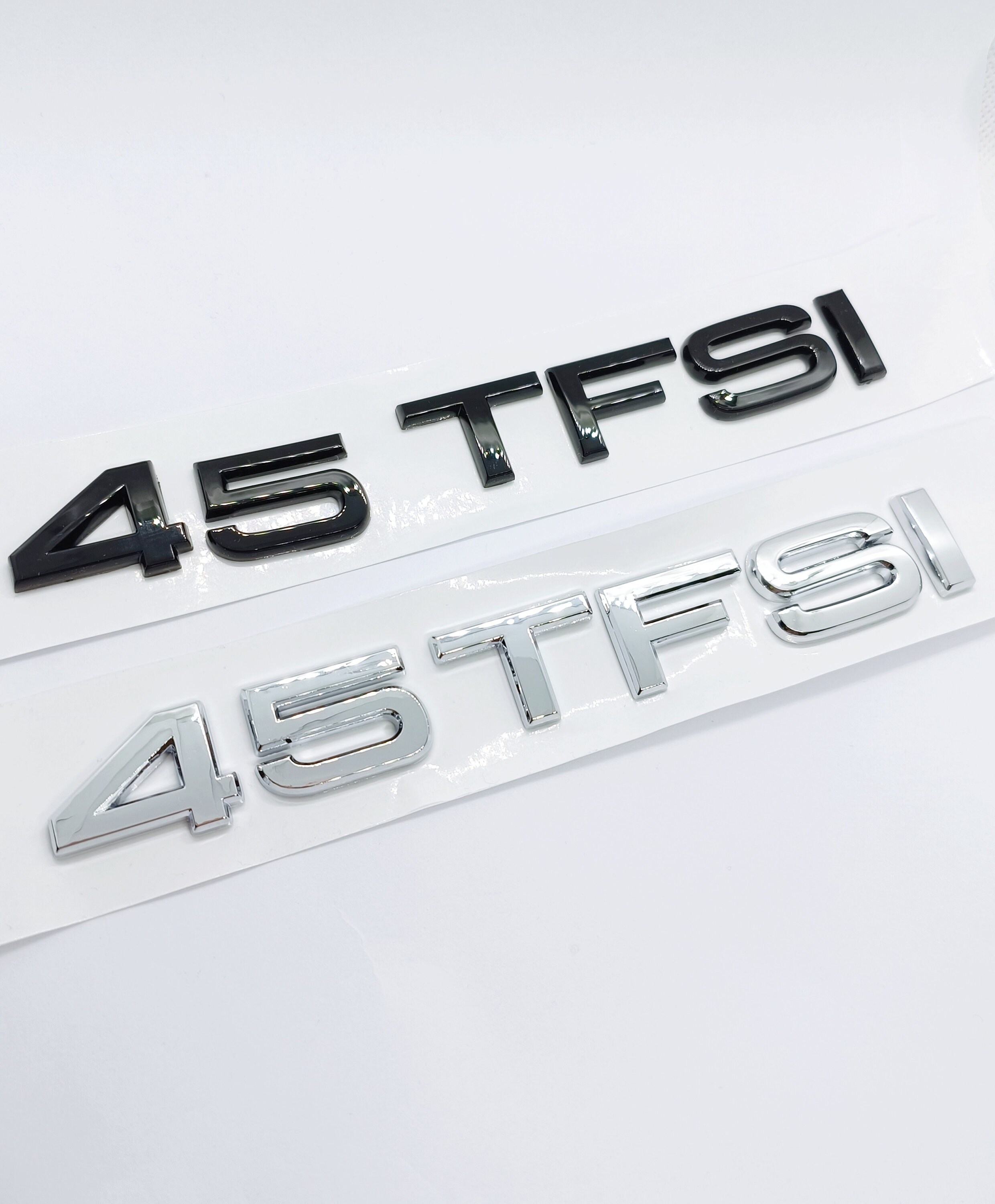 Emblème logo 45 TFSI arrière coffre Noir Brillant 175x20 MM pour Audi -   France