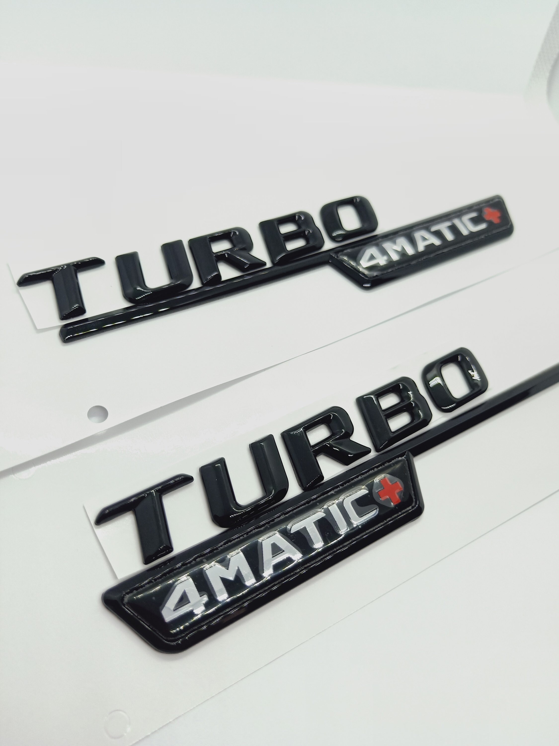 thumbnail image 2 of AMG Turbo 4MATIC+ Plus Fender Emblem Badges – Chrome, 2pcs – For Mercedes E53 CLS53 GLE53 GT53 2 of 3