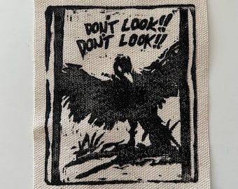 the crow - linocut patch