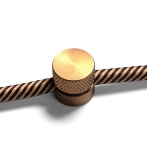 Wall mounting, metal cable clip for fabric cables, Lamp wire decentraliser Brushed bronze