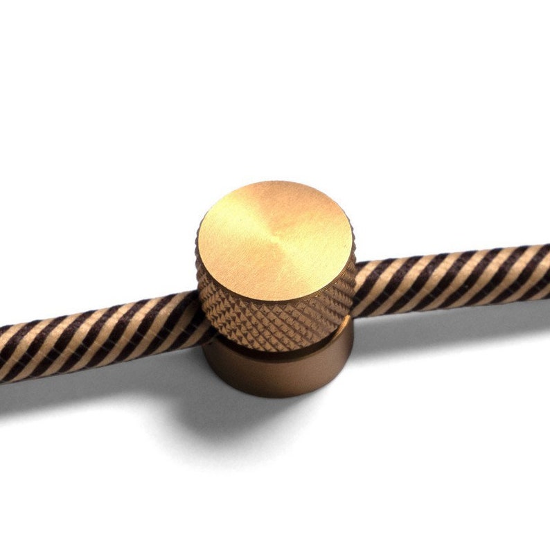 Wall mounting, metal cable clip for fabric cables, Lamp wire decentraliser Brushed bronze