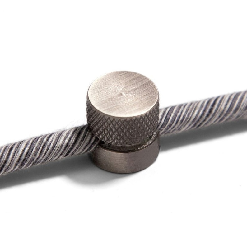 Wall mounting, metal cable clip for fabric cables, Lamp wire decentraliser Brushed titanium