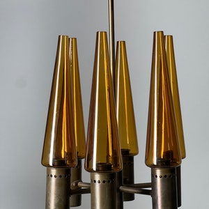 SNEAK PEEK… Hans-Arne Jakobsson 6 Arm Chandelier in Brass and Amber Glass. Sweden 1960s.