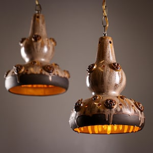 A pair of vintage ceramic stoneware pendant lamps made in Denmark 1960’s MCM Danish lighting design
