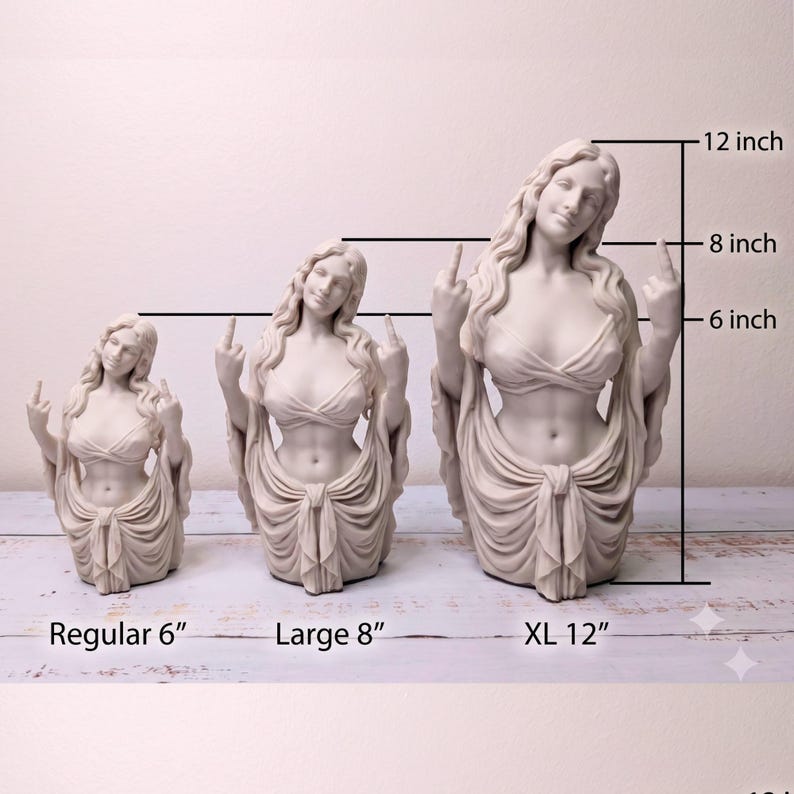 May include: Three off-white female busts in different sizes, each with long hair, wearing a draped top and skirt, and gesturing with both middle fingers raised. The sizes are labeled as Regular 6 inches, Large 8 inches, and XL 12 inches.