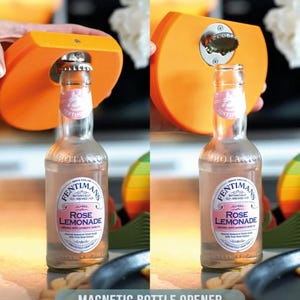 May include: An orange magnetic bottle opener is used to open a bottle of Rose Lemonade. The bottle has a pink label with the text "Rose Lemonade". The words "Magnetic Bottle Opener" are at the bottom of the image.