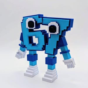 May include: A 3D-printed figure of the numbers 67, in a pixelated style. The figure is primarily light blue with dark blue accents, white hands, and white stair-like feet. The eyes are black with white outlines.