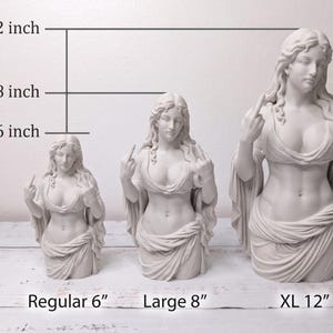 May include: Three matte white busts of a woman with long wavy hair, each displaying a middle finger gesture on both hands. The statues are labeled by height as Regular 6 inch, Large 8 inch, and XL 12 inch, with corresponding size markers.