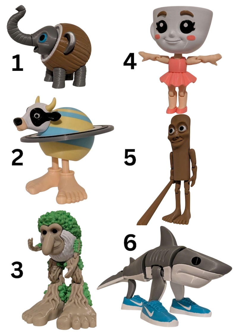 May include: A collection of six whimsical figurines. The figurines include an elephant, a cow with a planet body, a tree-like creature, a ballerina, a stick figure, and a shark wearing blue sneakers. Each figure has a unique design and pose.